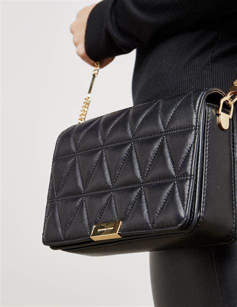 michael kors black and gold bag|michael kors gold clutch bag.